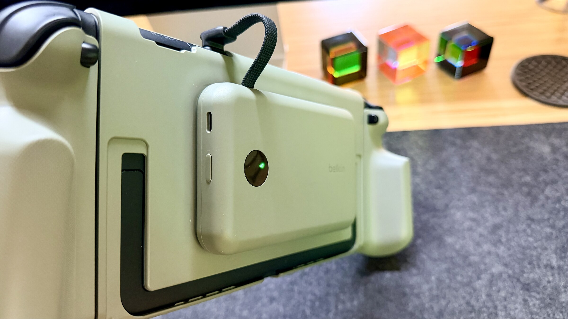 Short USB-C cable connecting the magnetic power bank